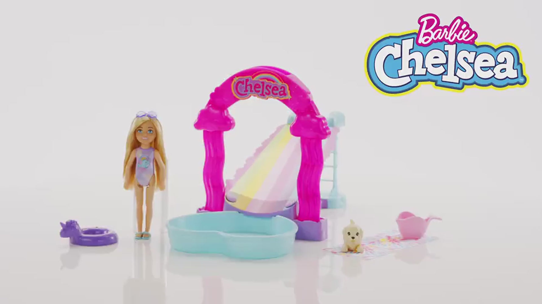 Barbie Chelsea - Mavričen Tobogan z malim kužkom (HTK39)